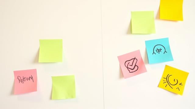 Sticky notes on a board with common HR policy pitfalls listed, representing problem-solving.